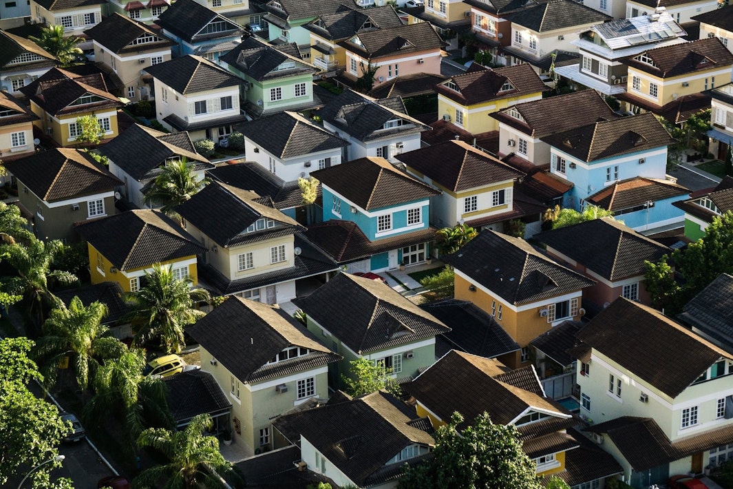 A view of multiple colorful houses.